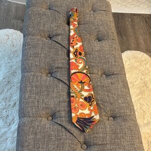 Psychedelic, baby!Vintage 70’s vibrant polyester Paisley tie-a trip for sure!